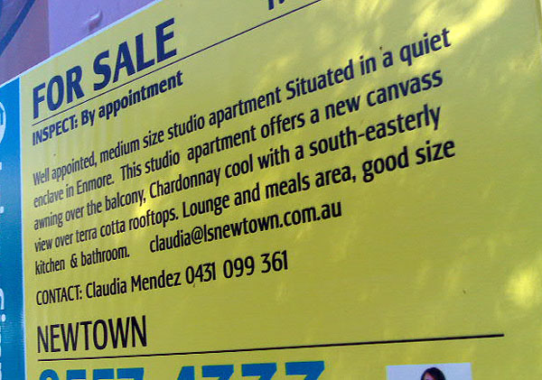 Photo of real estate sign reading: Well appointed medium size studio apartment Situated in a quiet enclave in Enmore. This studio apartment offers a new canvass awning over the balcony, Chardonnay cool with a south-easterly view over terra cotta rooftops. Lounge and meals area, good size kitchen & bathroom