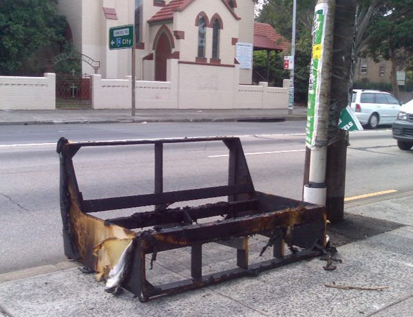 Photograph of burnt-out sofa on Stanmore Road, Enmore