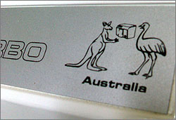 Photograph of Porsche 2400 Turbo hand dryer, with an image of a kangaroo and an emu drying their hands