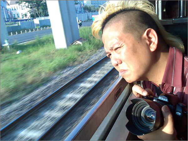 Photo of Trinn Suwannapha taken on the train returning to central Bangkok from Don Mueng