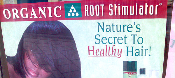 Photograph of sign advertising Organic Root Stimulator