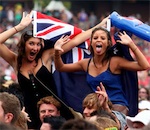 Elissa Cameron and Clare Werbeloff wave the Australian flag during the Big Day Out in Homebush Pic. Chris Hyde 