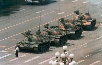 Tank Man — This famous photo, taken on 5 June 1989 by photographer Jeff Widener, depicts an unknown man halting the PLA's advancing tanks near Tiananmen Square.
